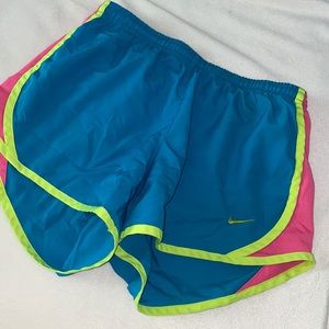 Blue neon colored Nike shorts